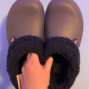 Fuzzy gray Crocs slippers